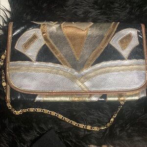 Chic Black and Gold Geometric Clutch